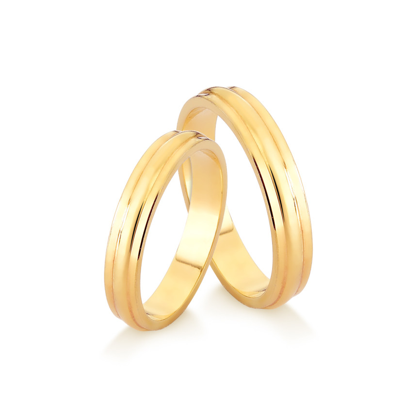 Aliança em ouro amarelo 18 kt , anatômica, com friso central em alto relevo {unitário}