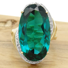 Anel com Cristal de Turmalina Paraíba e 10 Diamantes, em Ouro Amarelo 18 Kilates