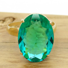 Anel com Cristal de Turmalina Paraíba Oval, em Ouro Amarelo 18 Kilates