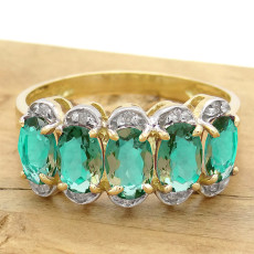 Meia Aliança com 5 Cristais de Turmalina Paraíba e 10 Diamantes, em Ouro Amarelo 18 Kilates