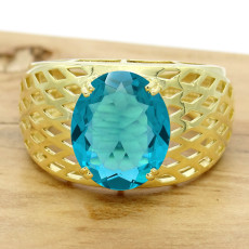 Anel Trabalhado com Sky Blue Oval, em Ouro Amarelo 18 Kilates