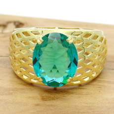 Anel Trabalhado com Cristal de Turmalina Paraíba Oval, em Ouro Amarelo 18 Kilates