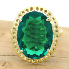 Anel Trabalhado com Cristal de Turmalina Paraíba Oval, em Ouro Amarelo 18 Kilates