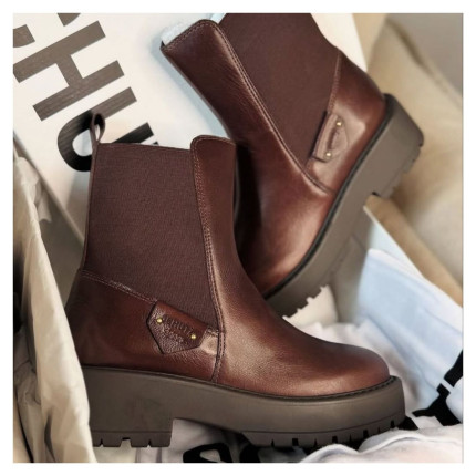 Coturno Chelsea Schutz