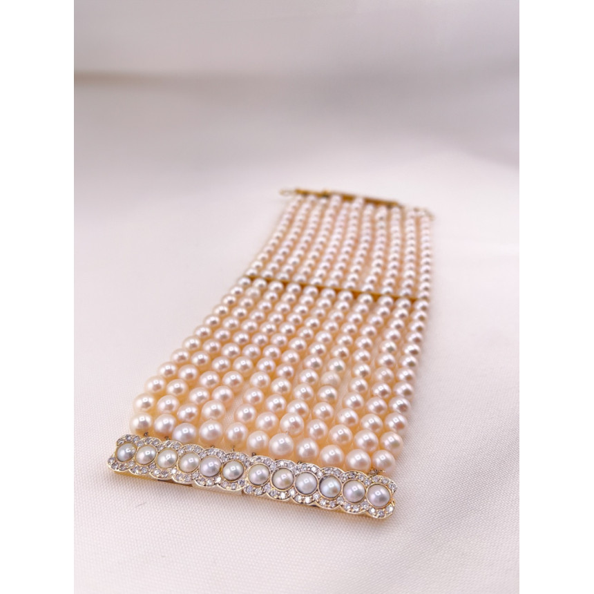 Pulseira de pérolas e diamantes